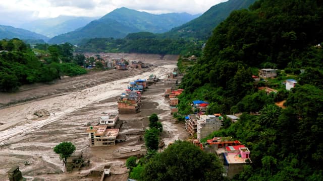 Flash floods, landslides leave hundreds killed, missing in Nepal-China