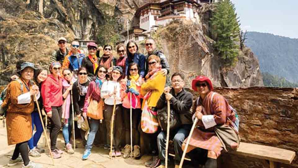 Bhutan halves tourist fee to attract international visitors